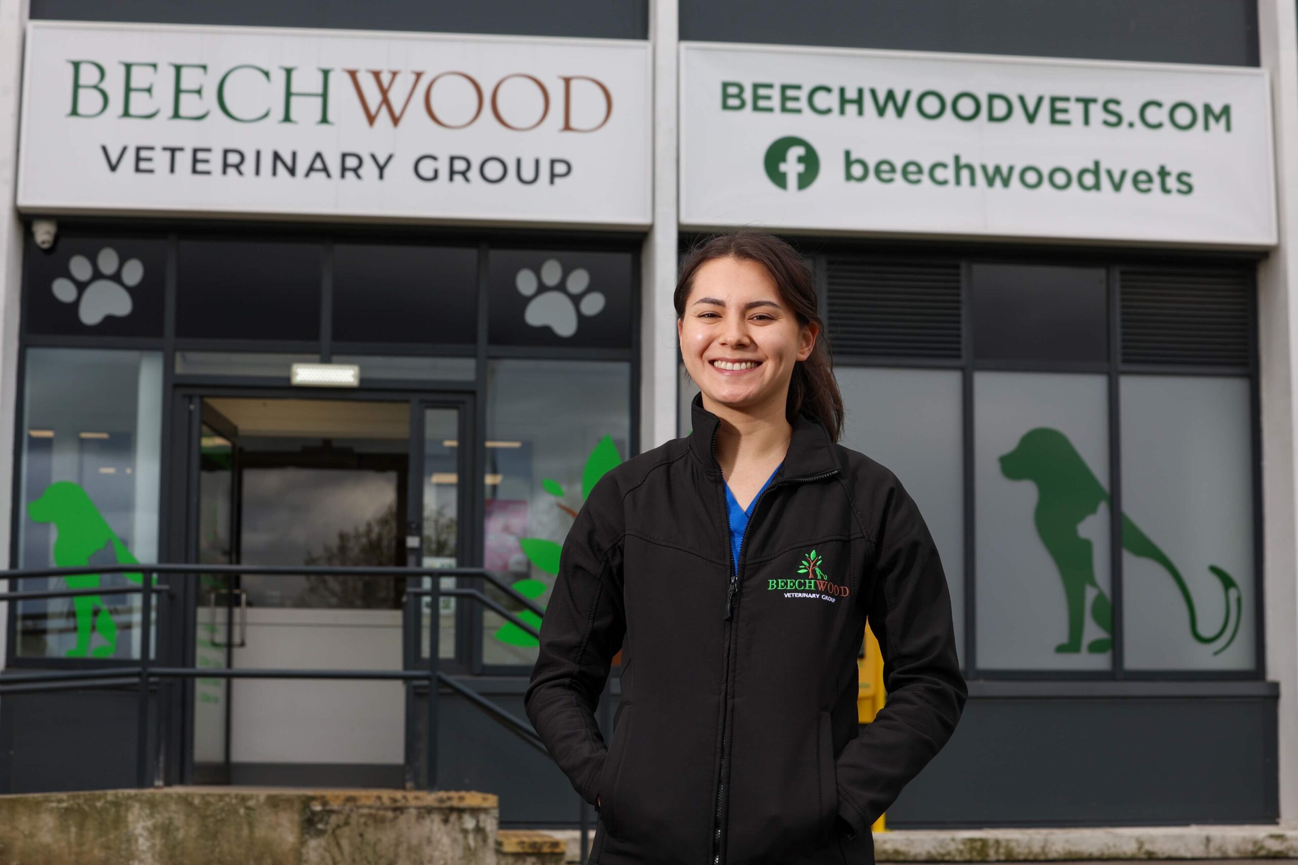 Alice pictured outside entrance to Beechwood Vets.