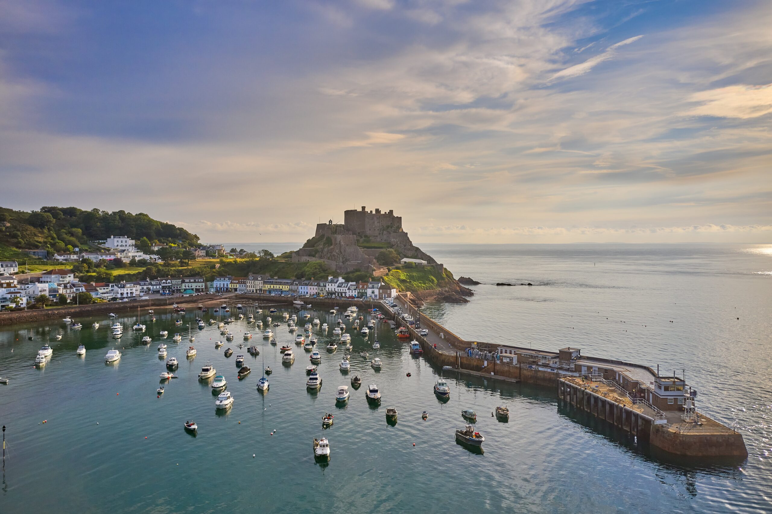 Drone aerial view of Gorey Harbour at high tide. Jersey, Channel Islands